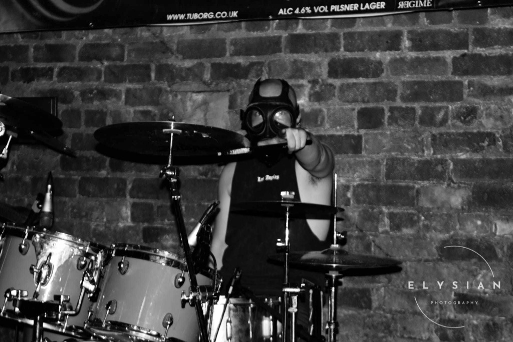 Drummer in Gas Mask